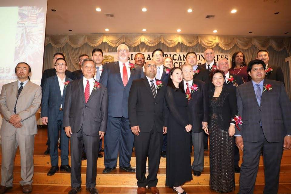 Group photo of AAC honorees on stage
