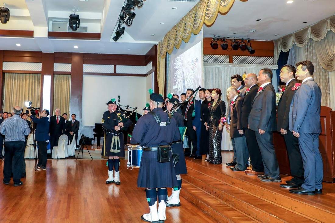 Honorees and pipers at the annual celebration